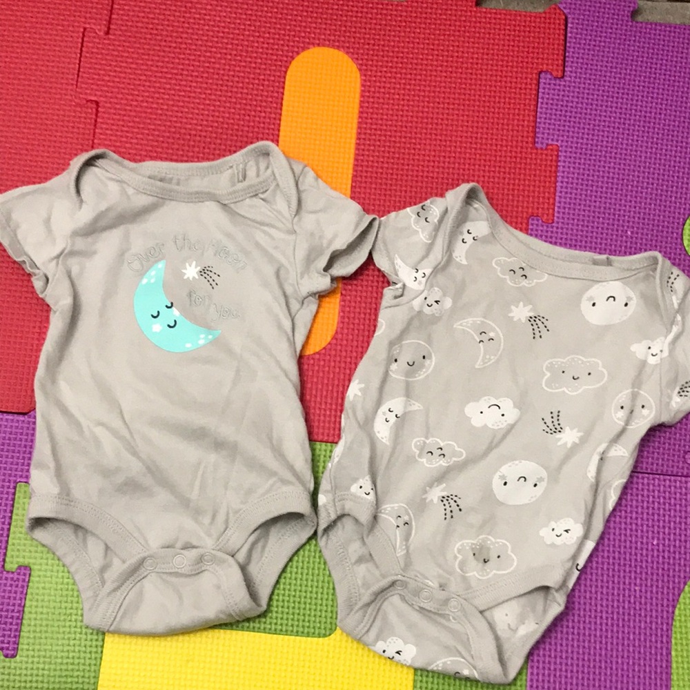 2 “Free Planet” onesies